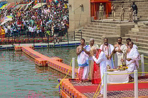 PM performs 'Ganga Poojan'